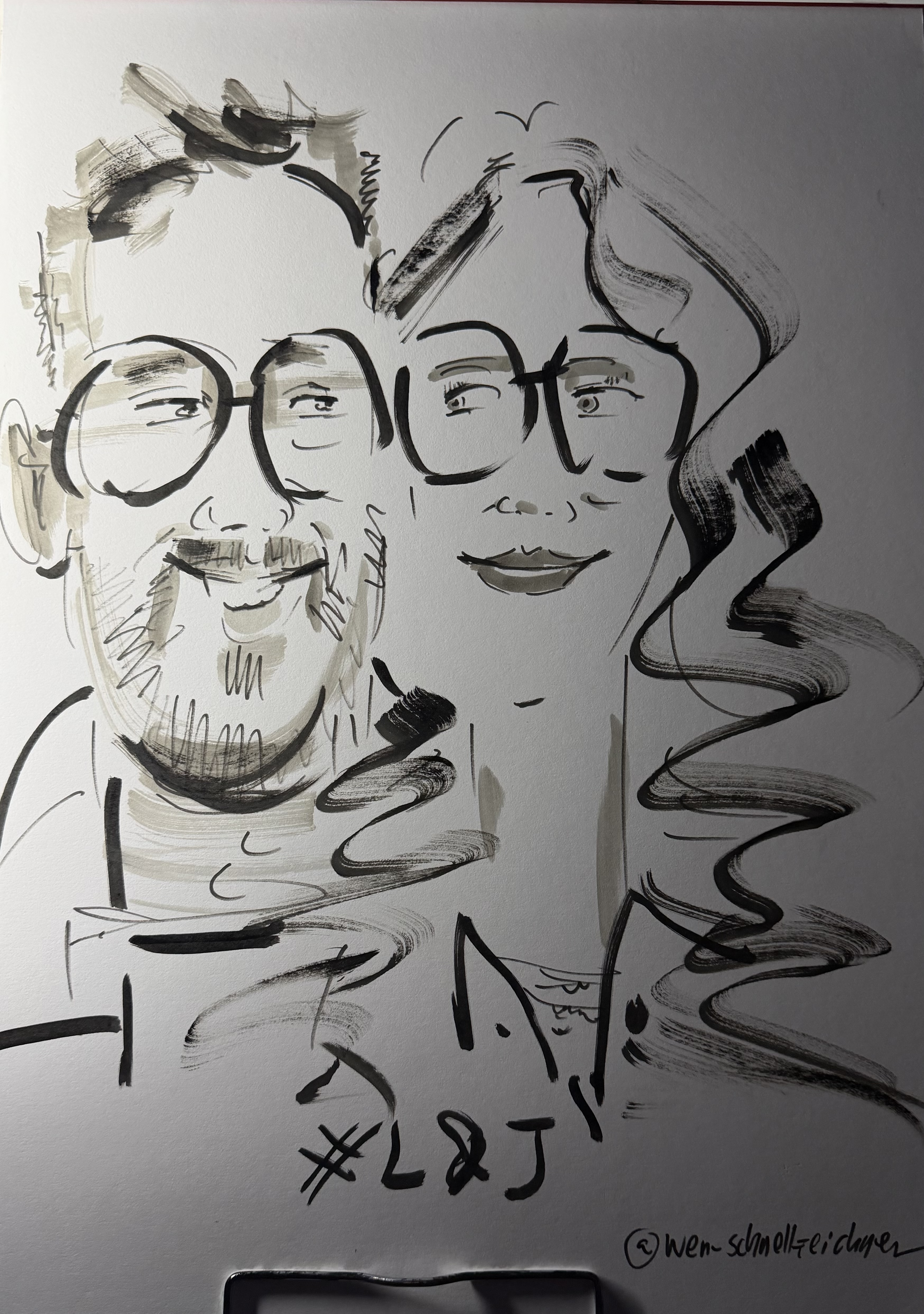 Live gezeichnete Karikatur eines Paares mit Brillen